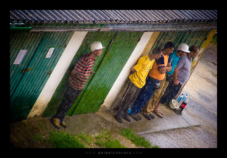 workers in the rain